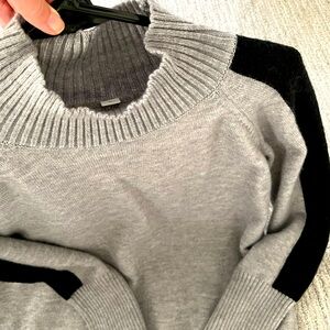Black and gray mock turtleneck sweater with black stripes down the sleeve size S
